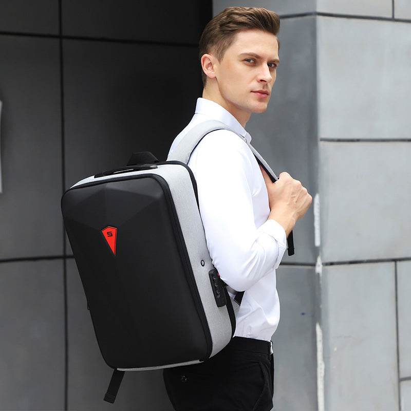 Man wearing alloy frame hard shell setting men's backpack with geometric pattern and breathable waterproof EVA material