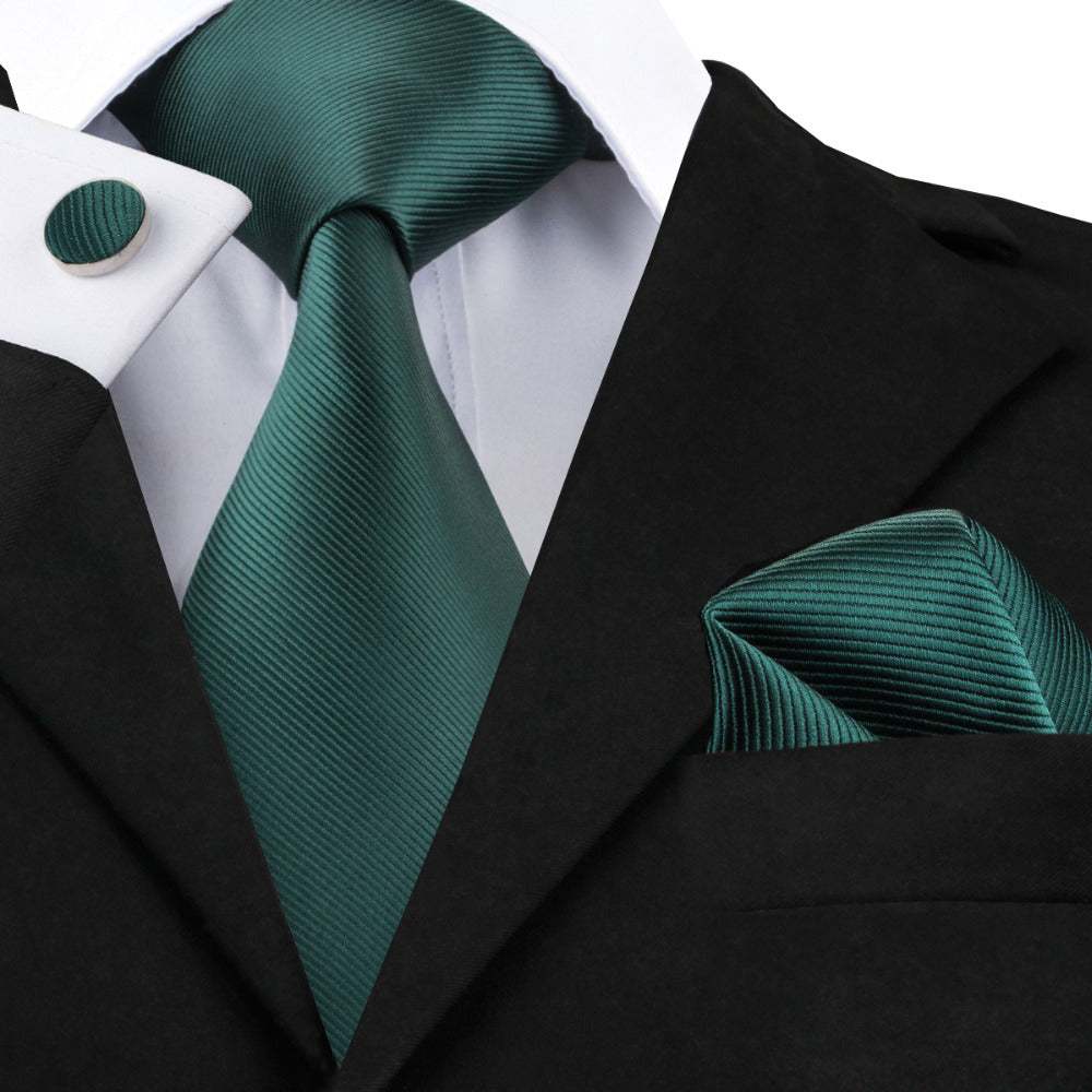 Solid Silk Mens Ties Neck Tie Set with green neck tie, matching pocket square, and cufflinks in black suit