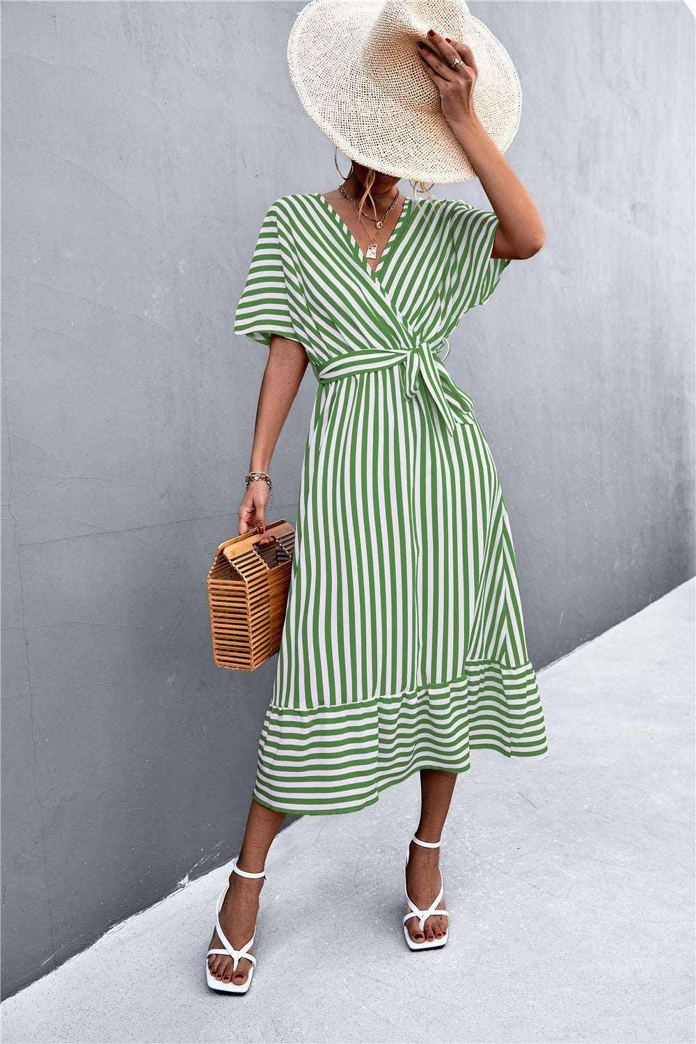 Classic hot selling product cross V-neck lace-up striped swing dress in yellow and green polyester fiber for spring and summer