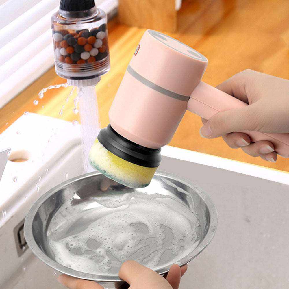 Electric Cleaning Brush cordless rechargeable with interchangeable brush heads scrubbing a metal dish in kitchen sink