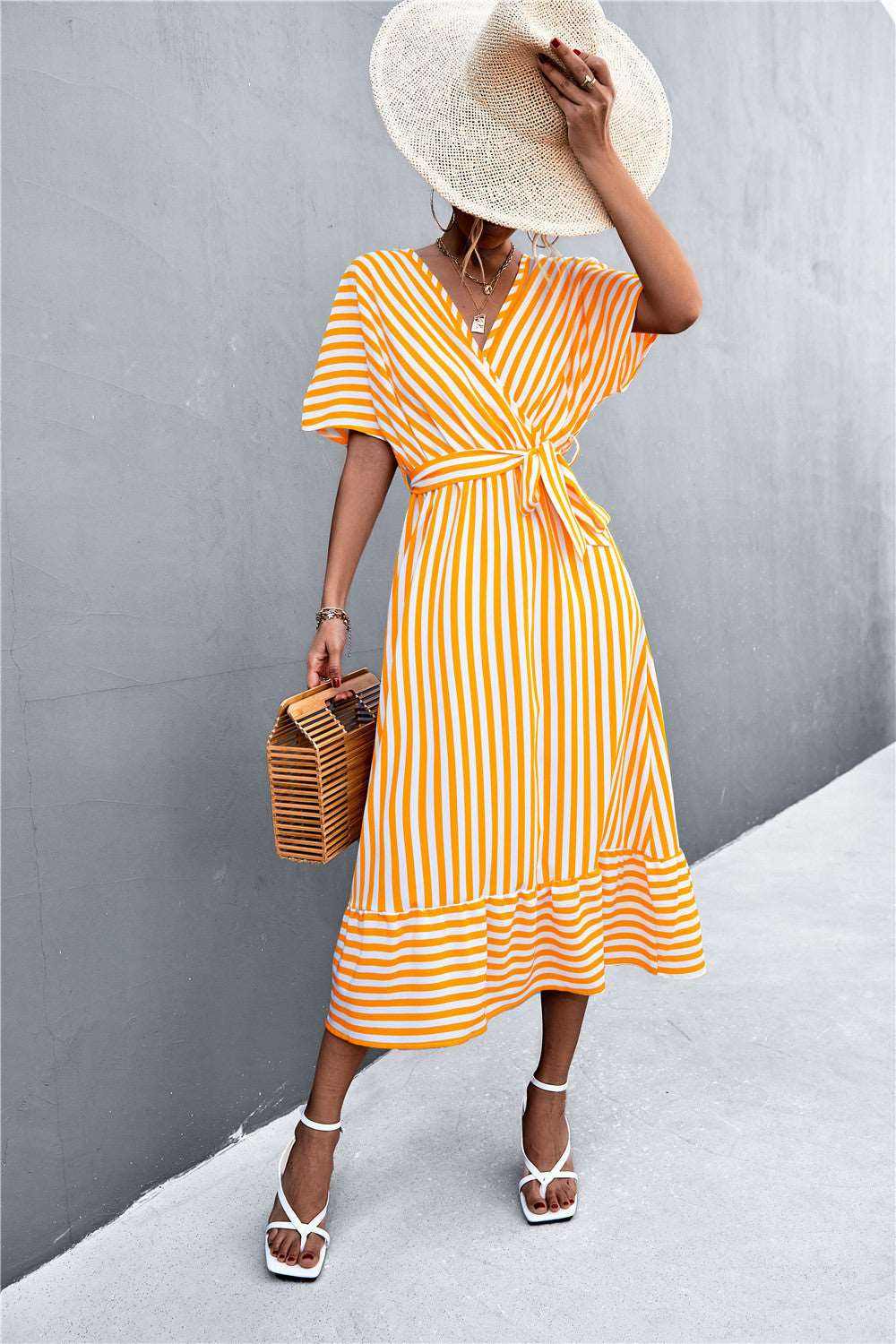 Classic hot selling product cross V-neck lace-up striped yellow green black swing dress for spring summer