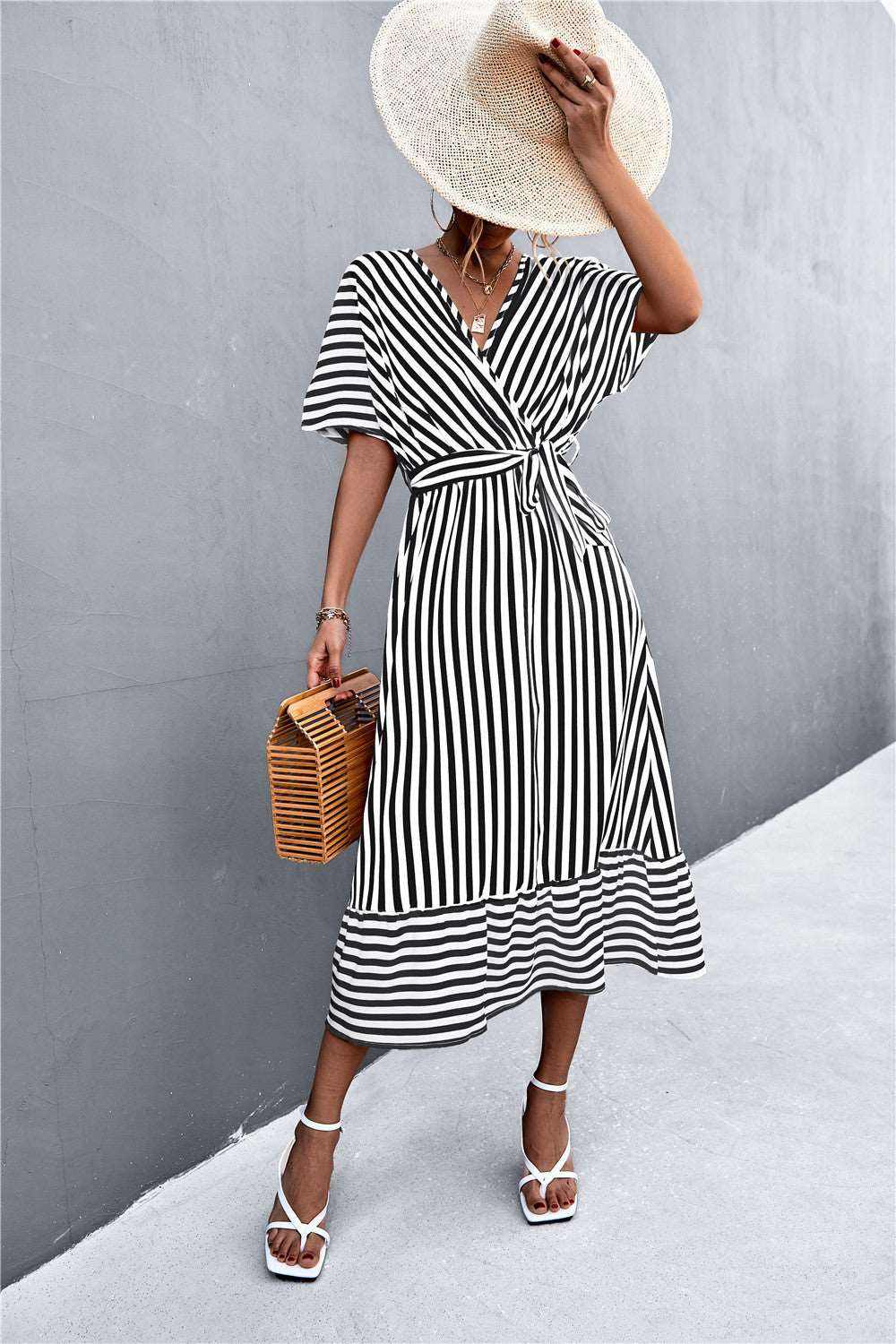 Classic hot selling product cross V-neck lace-up striped dress in yellow, green, and black with high waist and ruffles for spring and summer